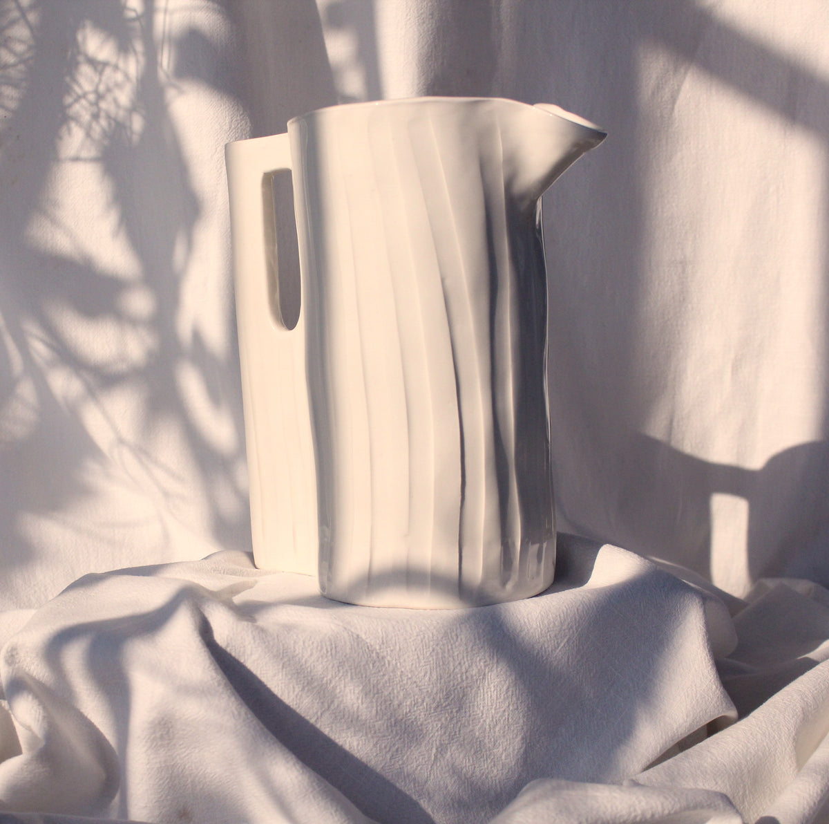 Large Hand-Carved White Ceramic Jug