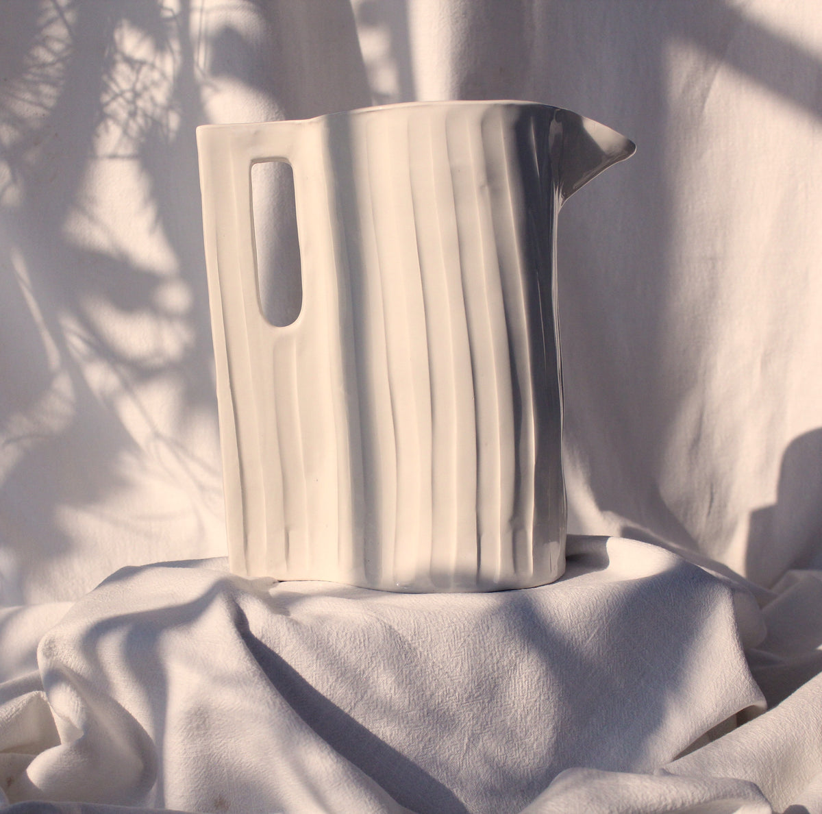 Large Hand-Carved White Ceramic Jug