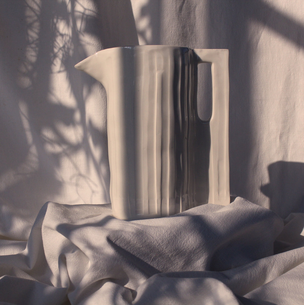 Large Hand-Carved White Ceramic Jug