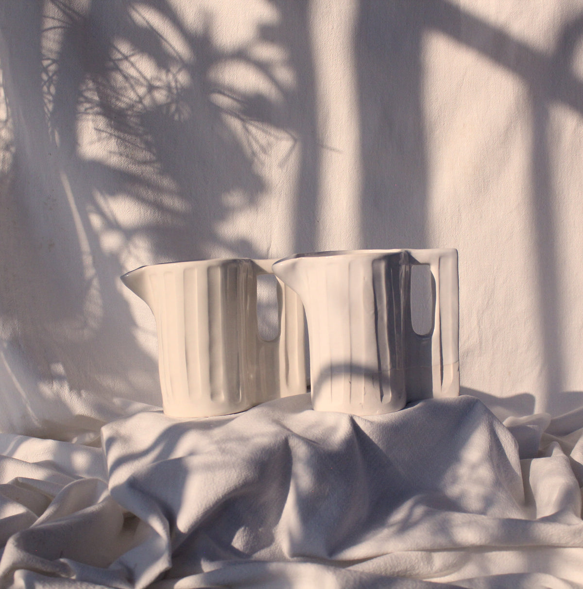 Medium Hand-Carved White Ceramic Jug